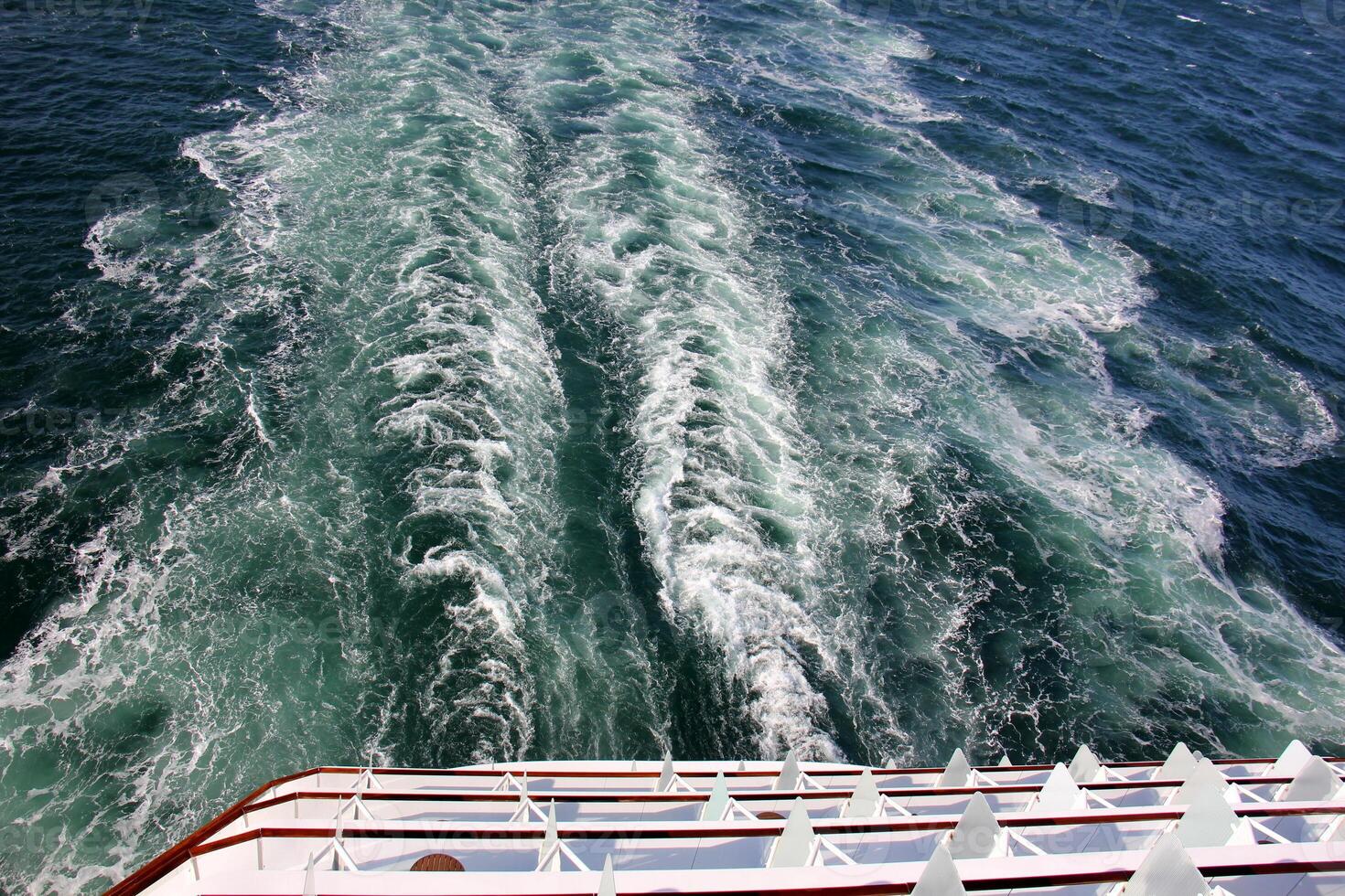 On the upper deck of a large ocean liner. photo