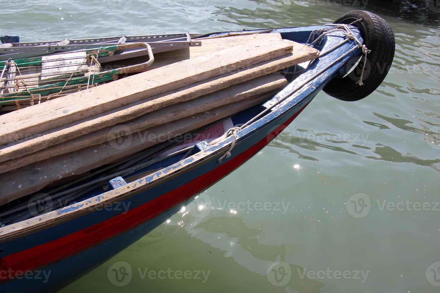 A pier on the shore for mooring boats and yachts. photo