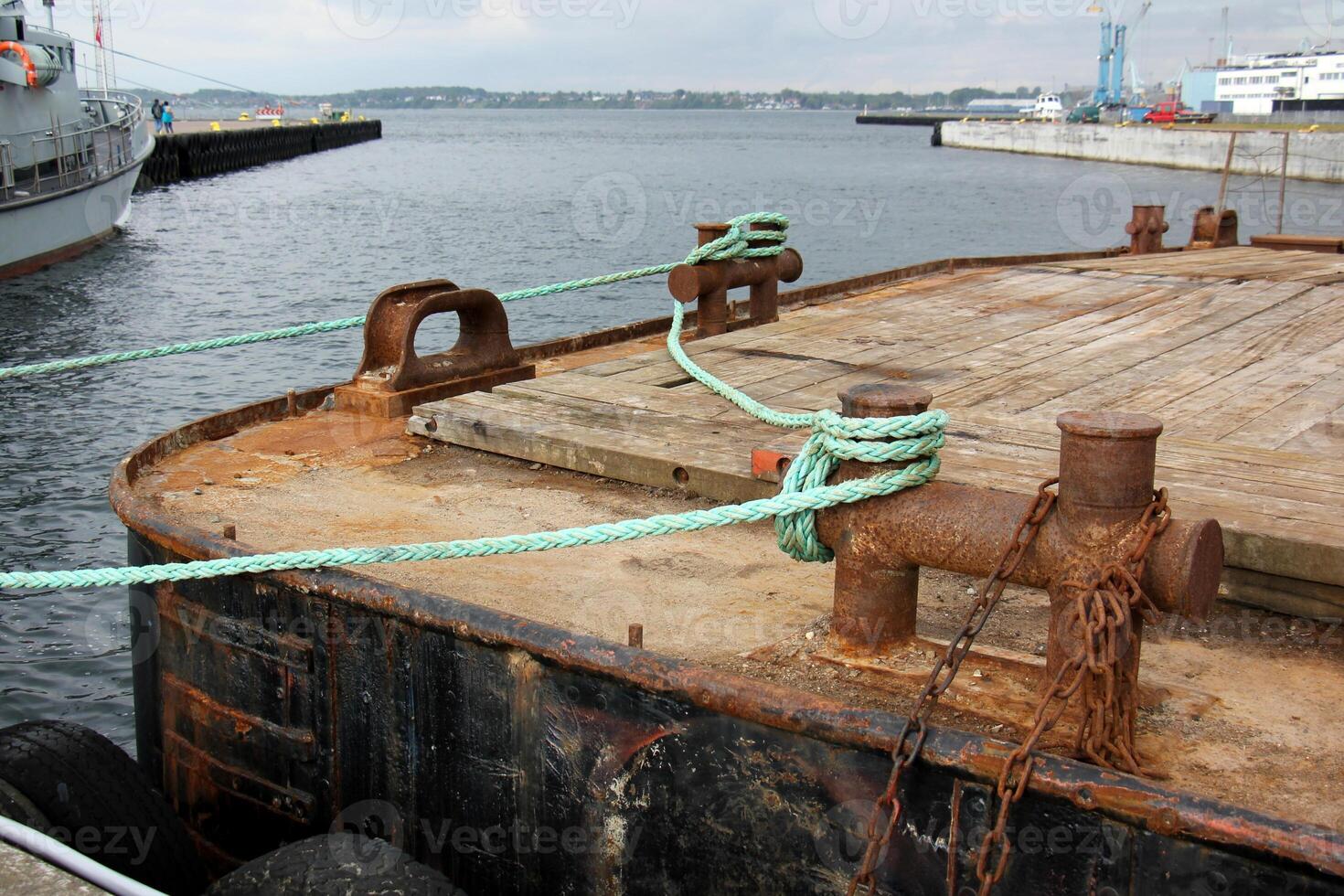 A pier on the shore for mooring boats and yachts. photo