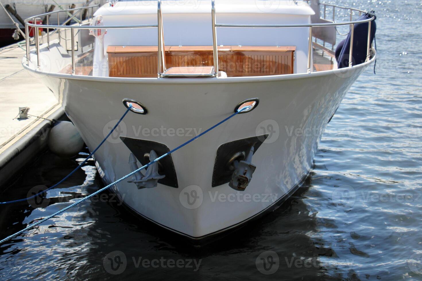 A pier on the shore for mooring boats and yachts. photo