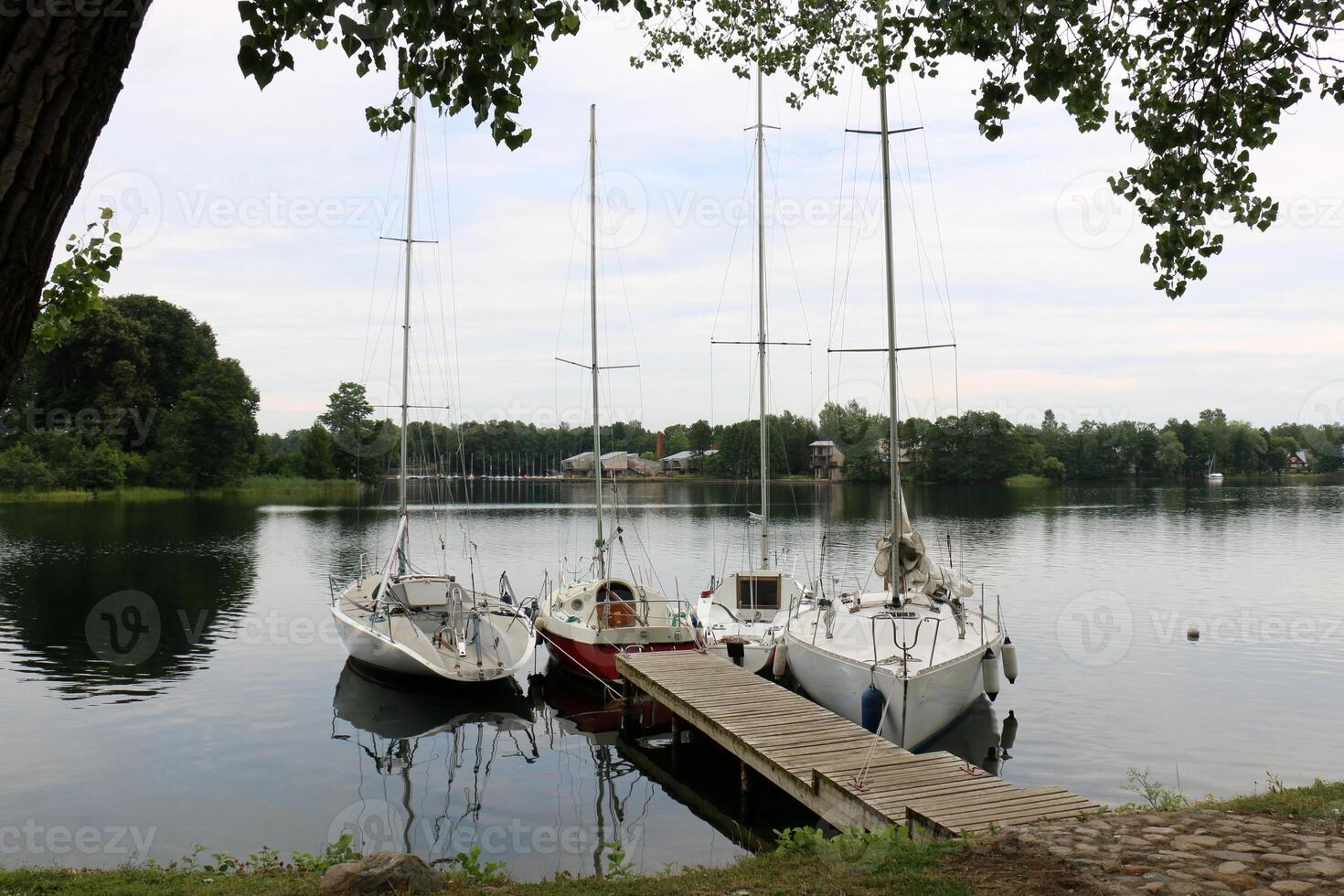 A pier on the shore for mooring boats and yachts. photo