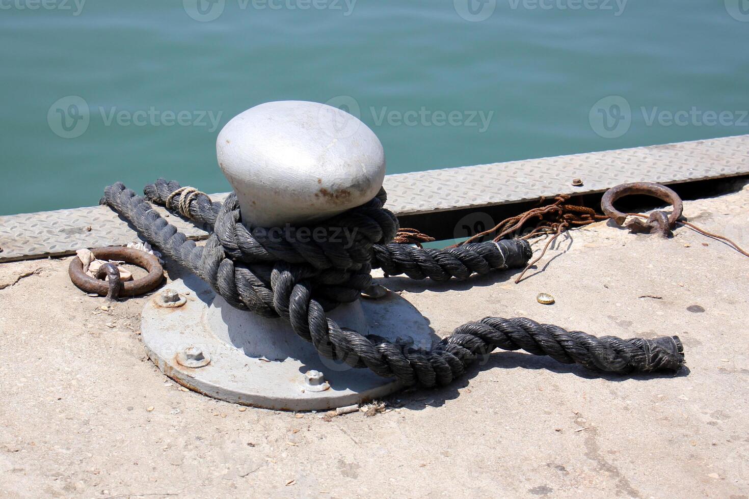 A pier on the shore for mooring boats and yachts. photo