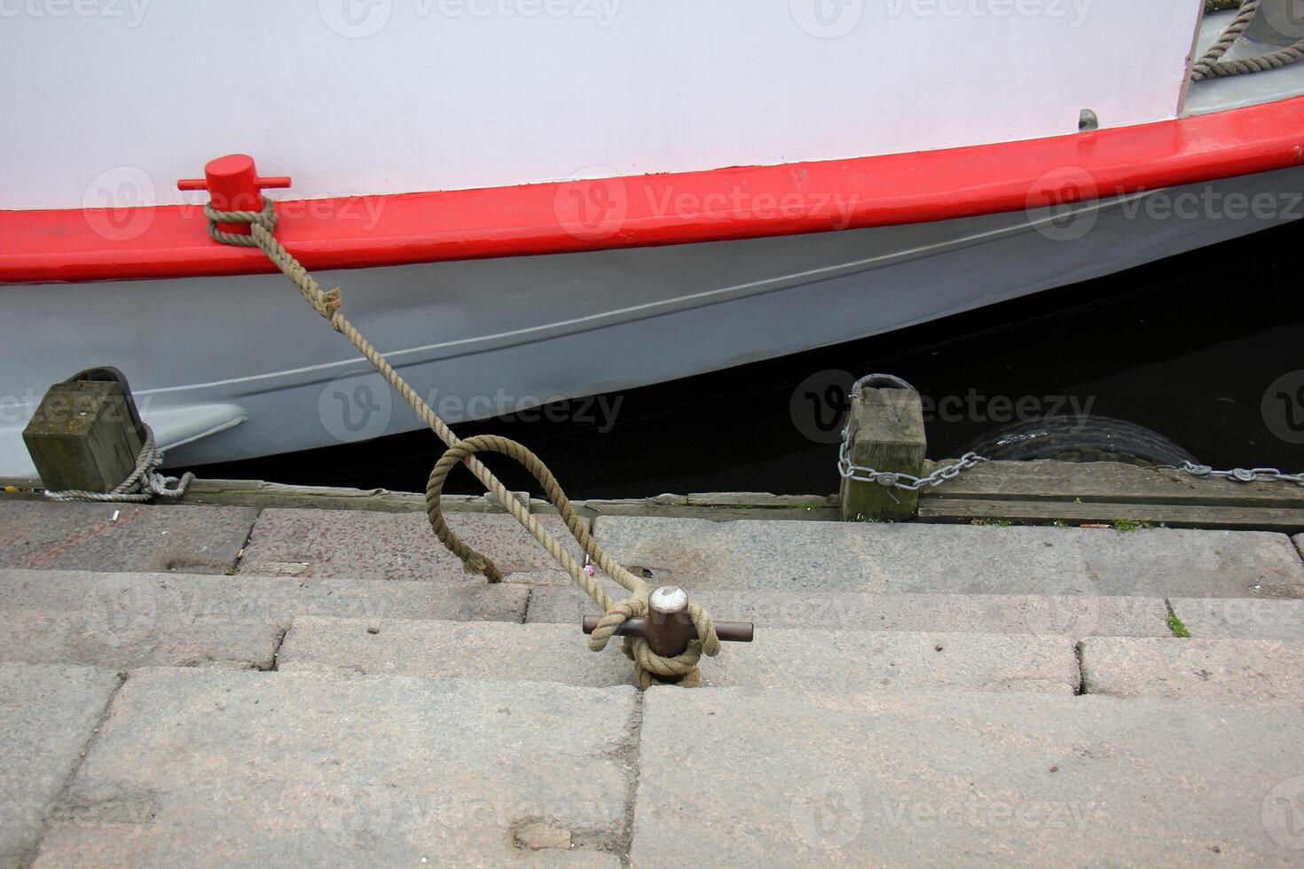 A pier on the shore for mooring boats and yachts. photo