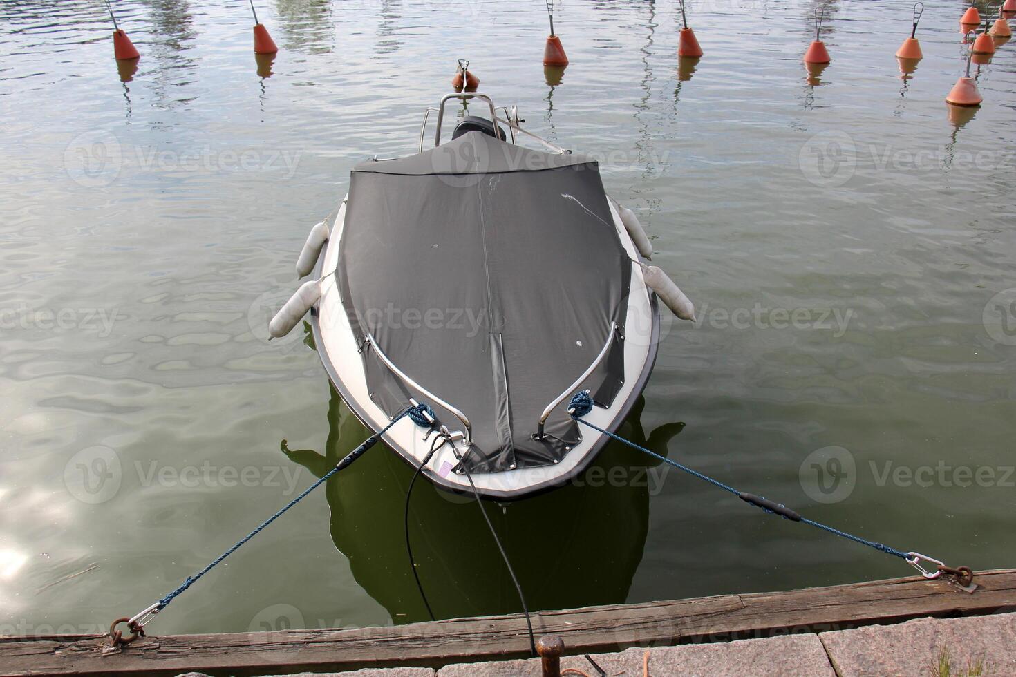 A pier on the shore for mooring boats and yachts. photo