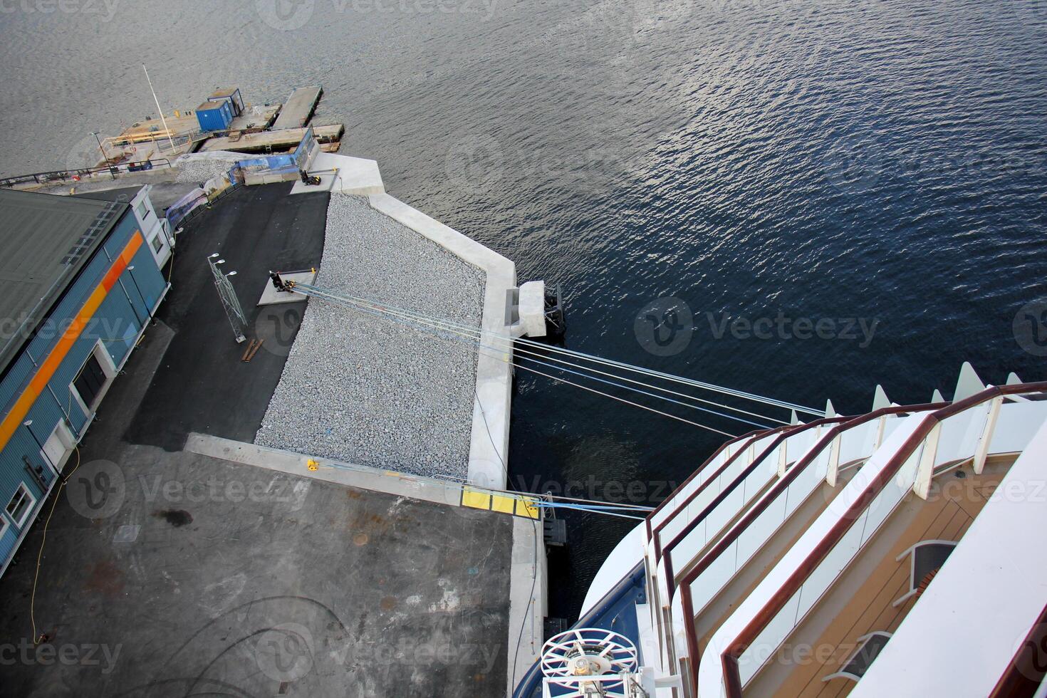 A pier on the shore for mooring boats and yachts. photo