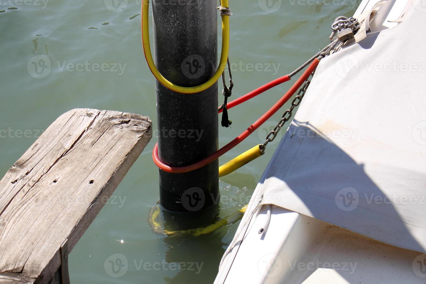 A pier on the shore for mooring boats and yachts. photo