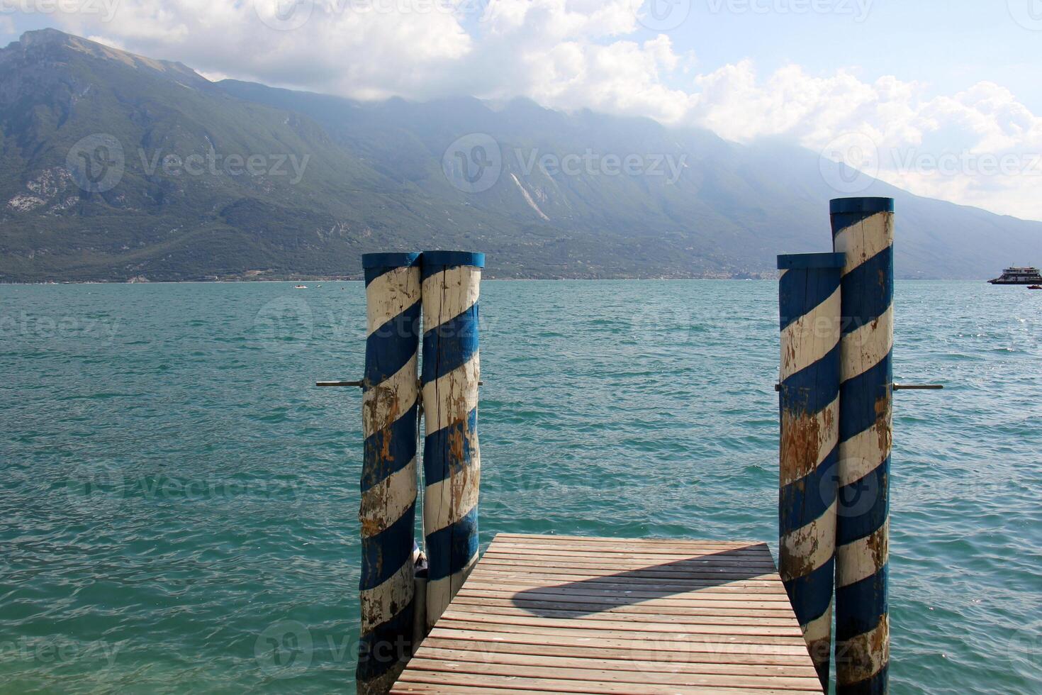 A pier on the shore for mooring boats and yachts. photo