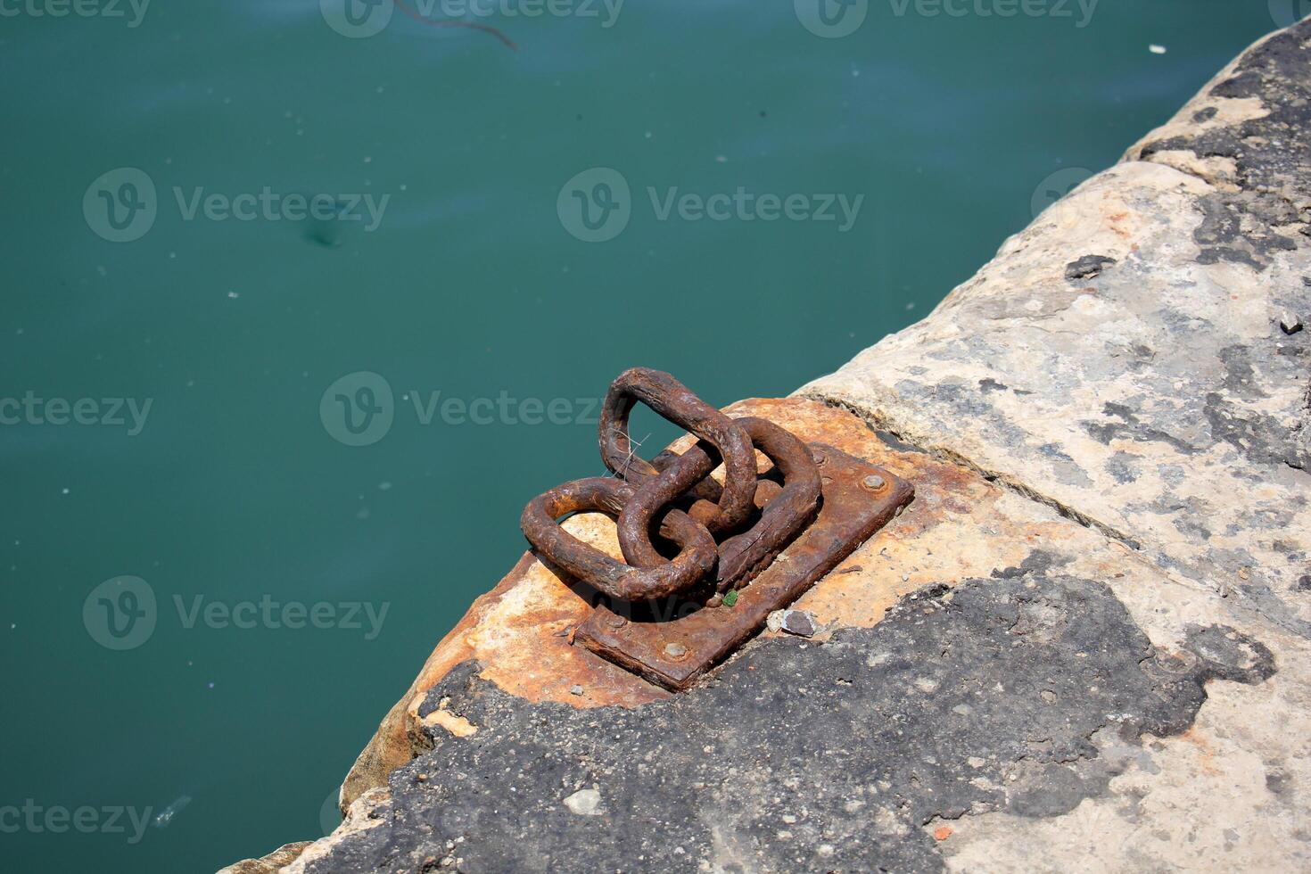 A pier on the shore for mooring boats and yachts. photo