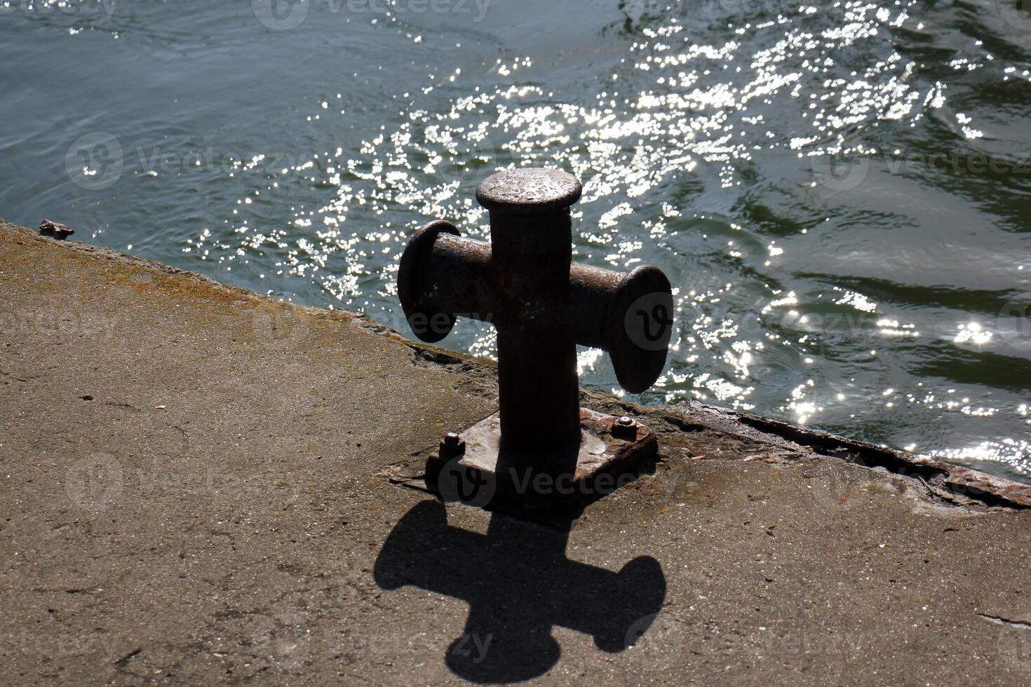 A pier on the shore for mooring boats and yachts. photo