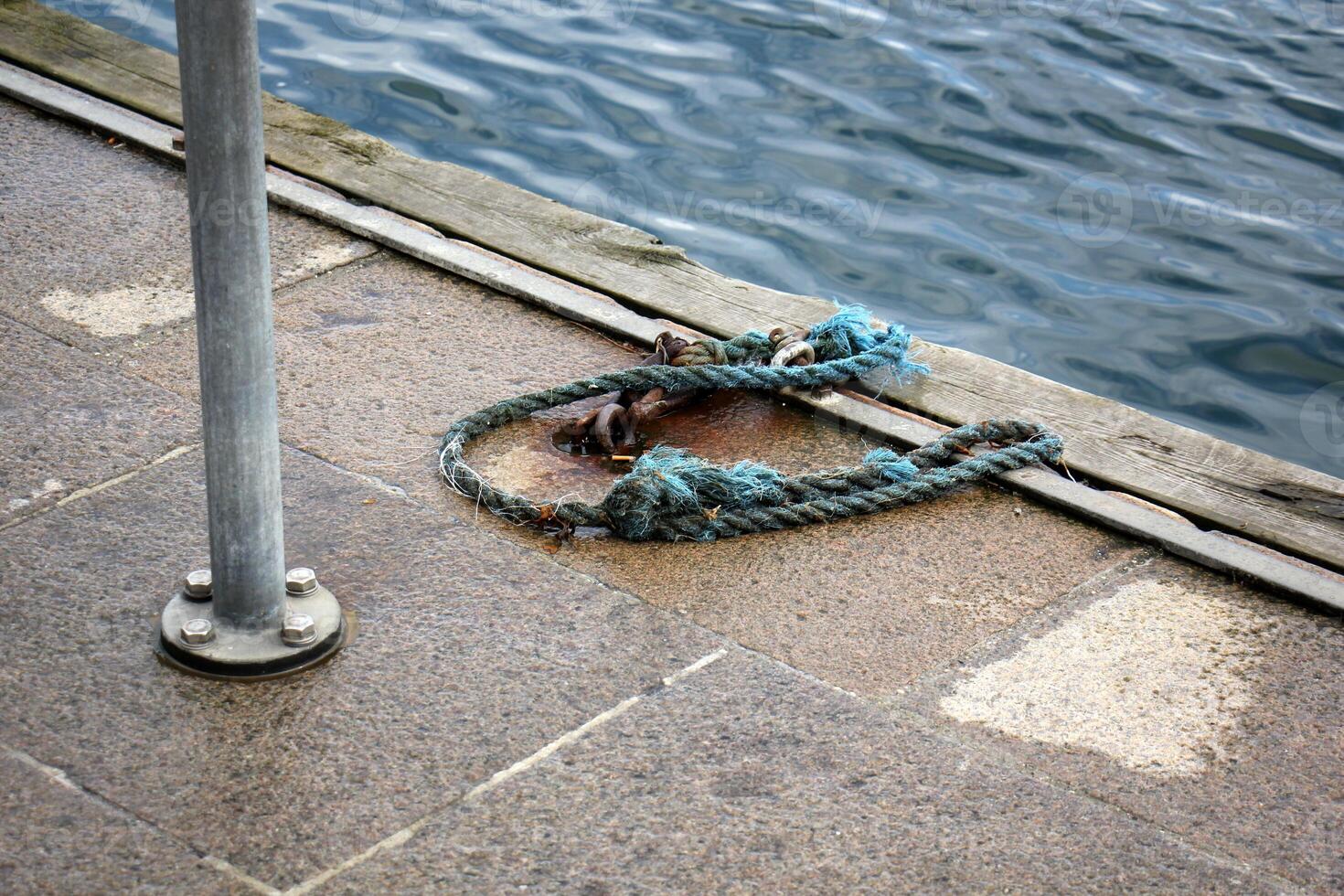A pier on the shore for mooring boats and yachts. photo