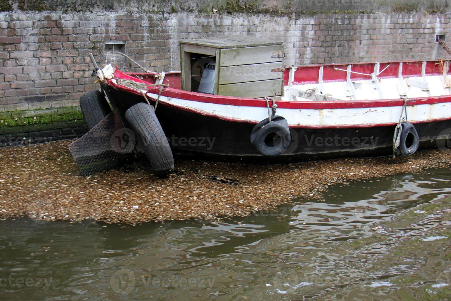 A pier on the shore for mooring boats and yachts. photo