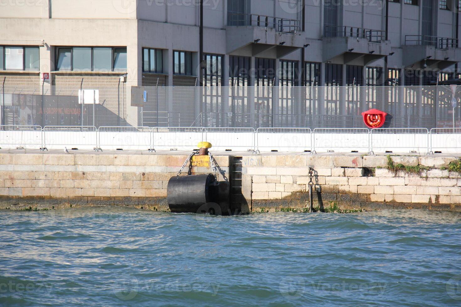 A pier on the shore for mooring boats and yachts. photo