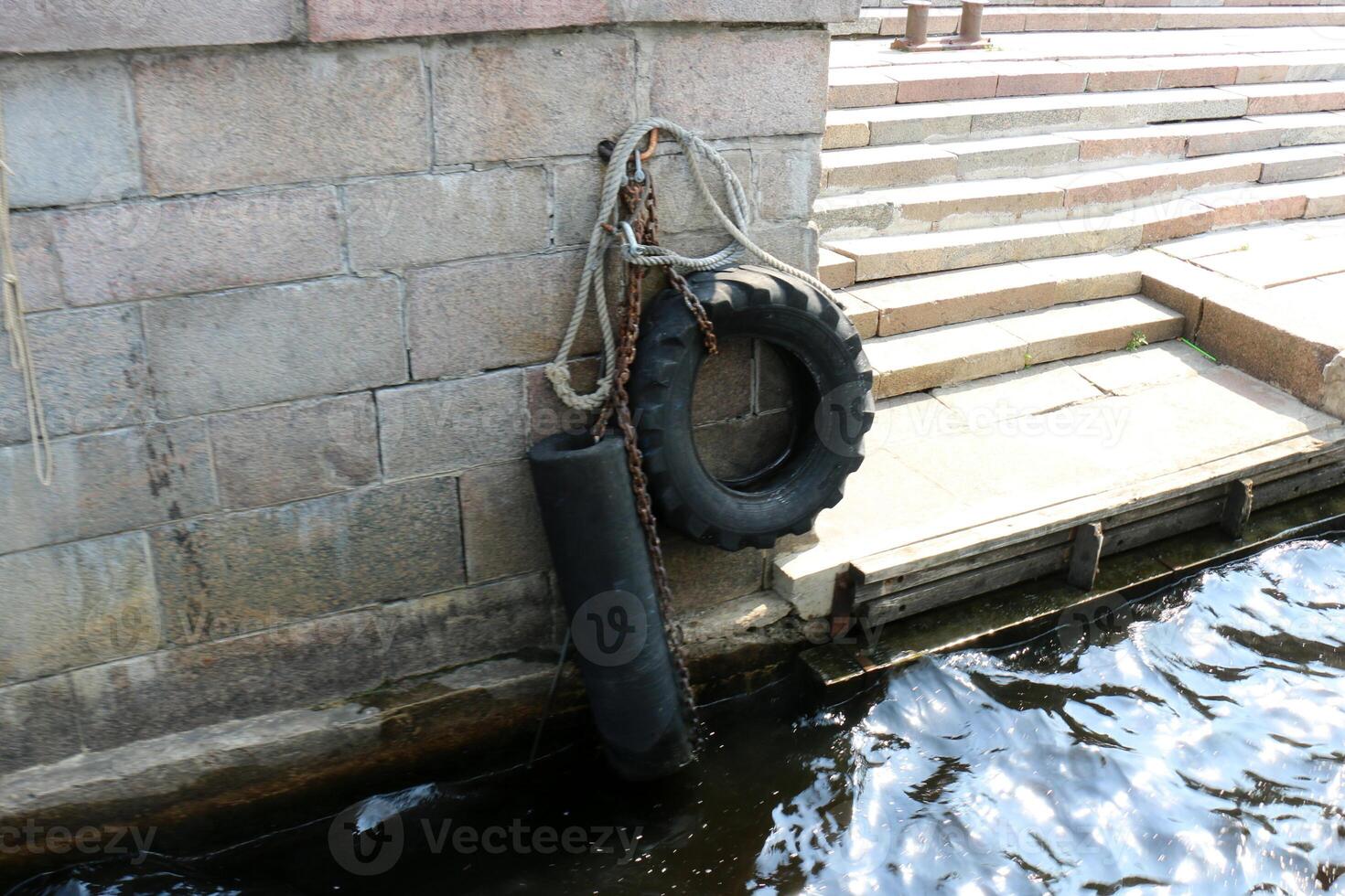 A pier on the shore for mooring boats and yachts. photo