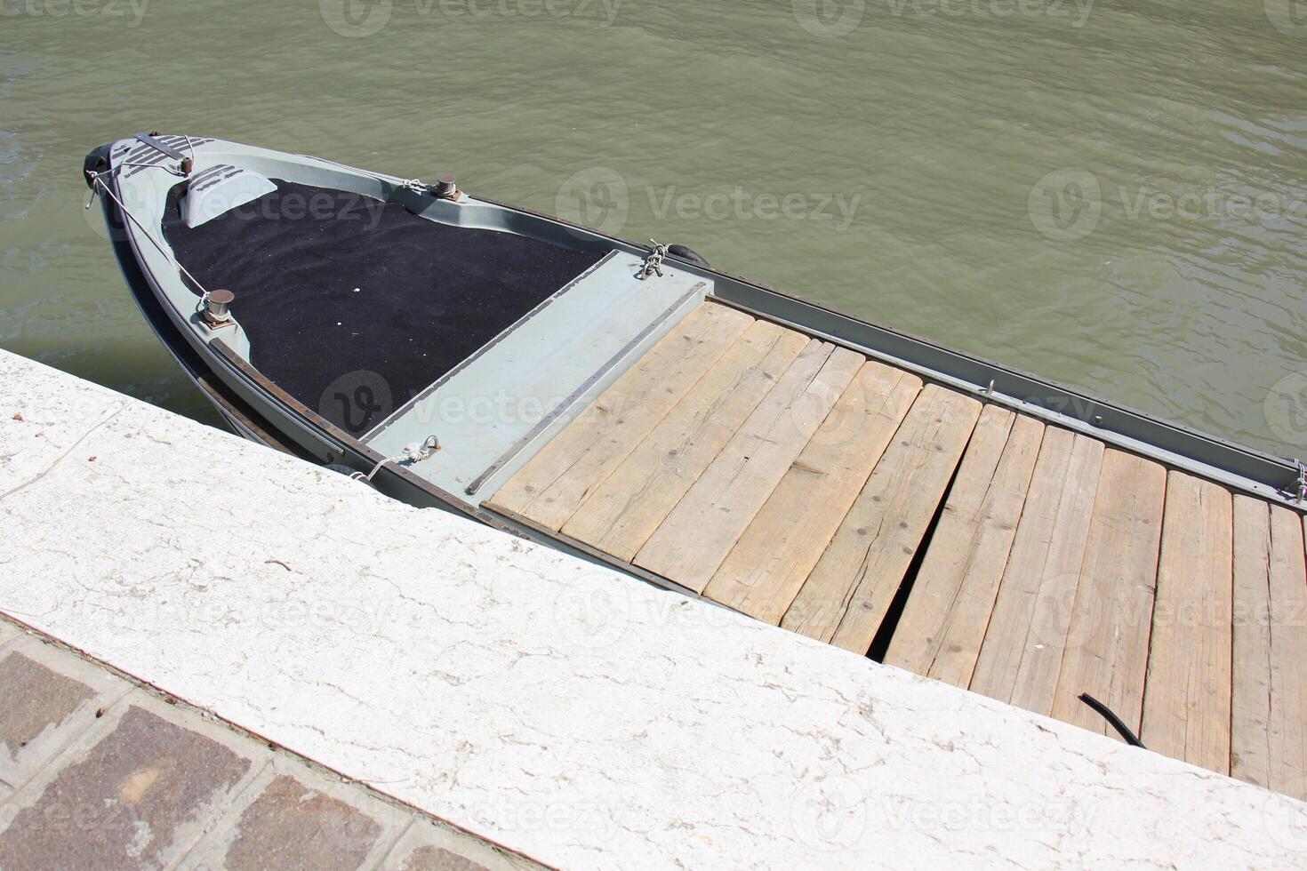 A pier on the shore for mooring boats and yachts. photo