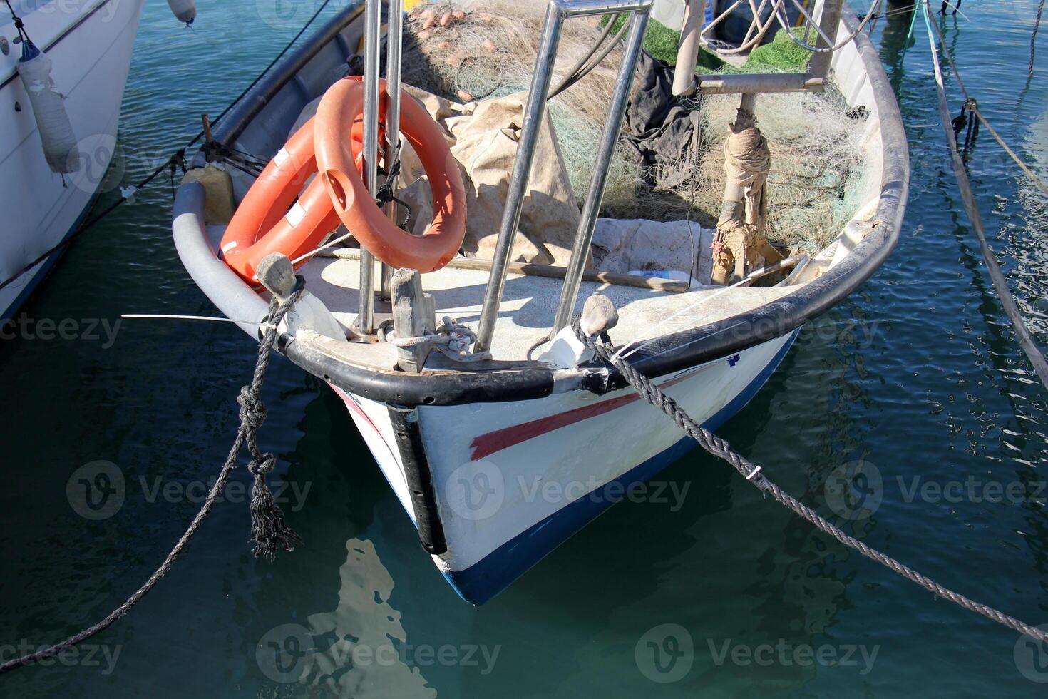 A pier on the shore for mooring boats and yachts. photo