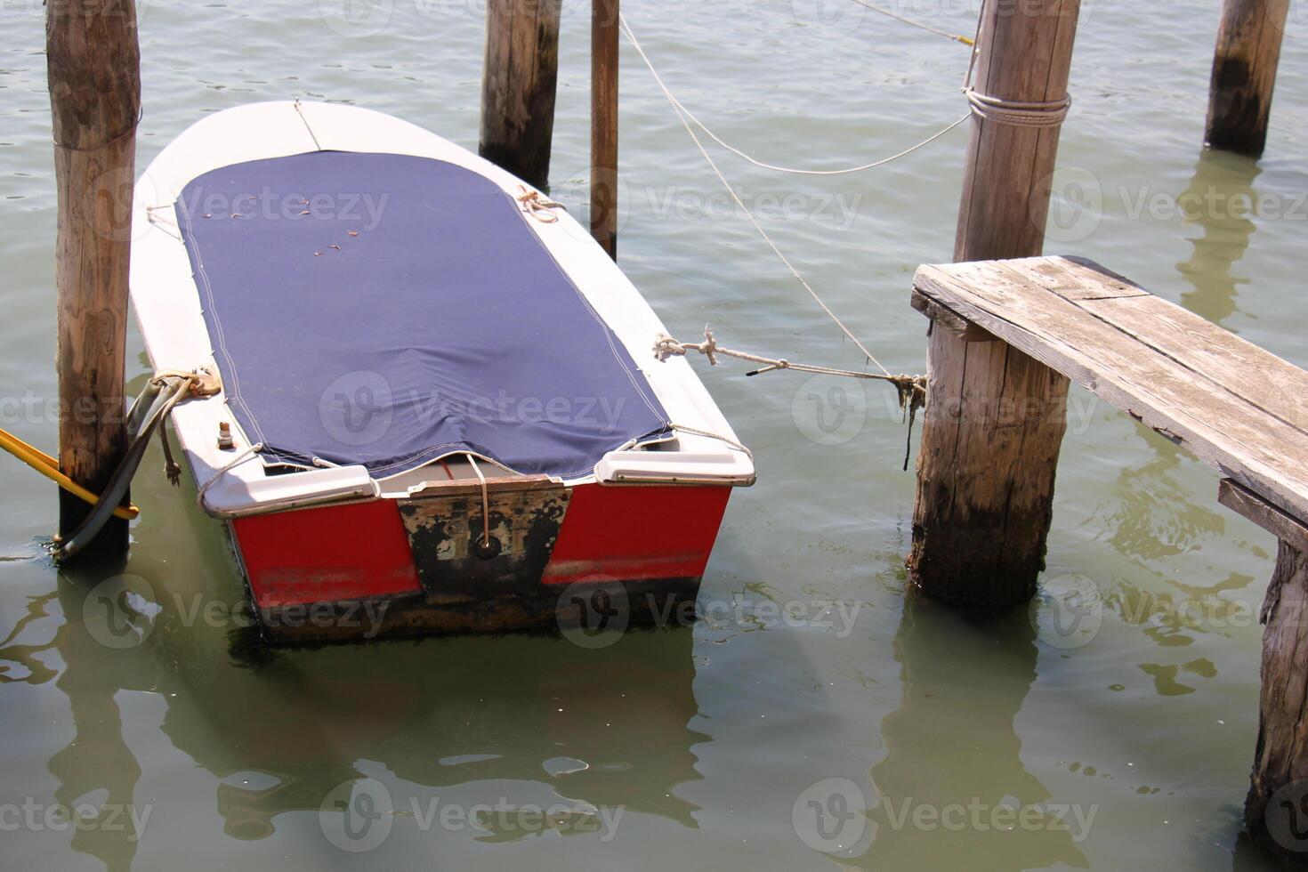 A pier on the shore for mooring boats and yachts. photo