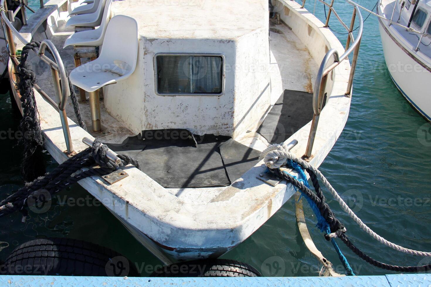 A pier on the shore for mooring boats and yachts. photo