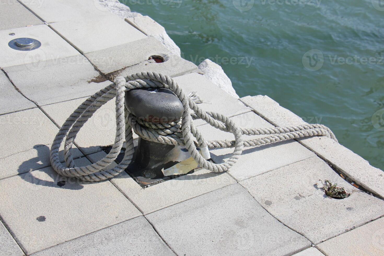 A pier on the shore for mooring boats and yachts. photo