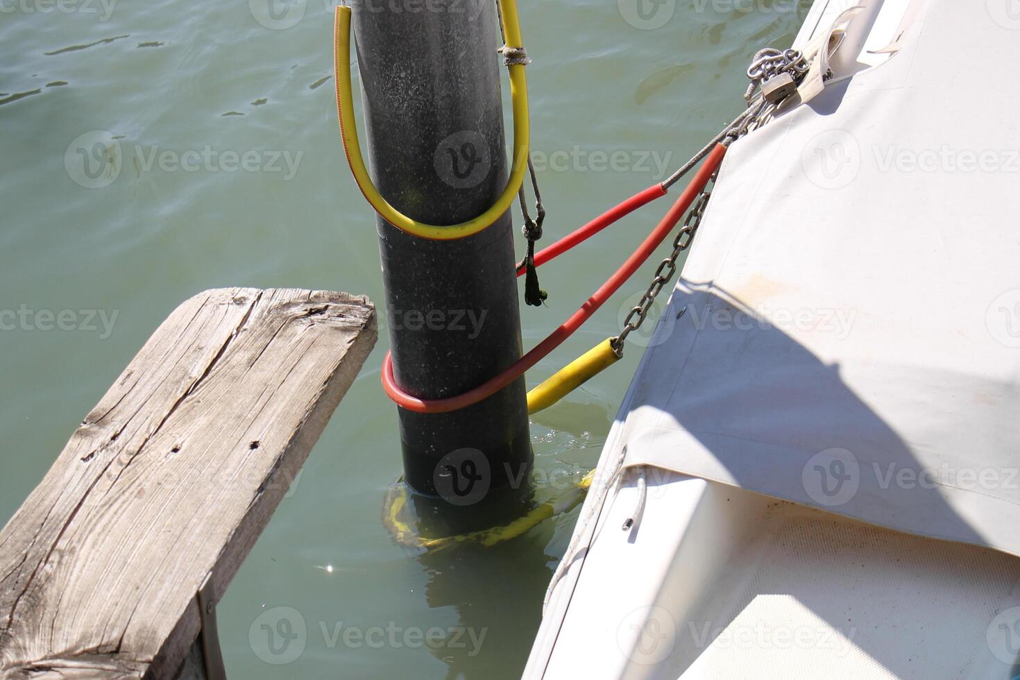 A pier on the shore for mooring boats and yachts. photo