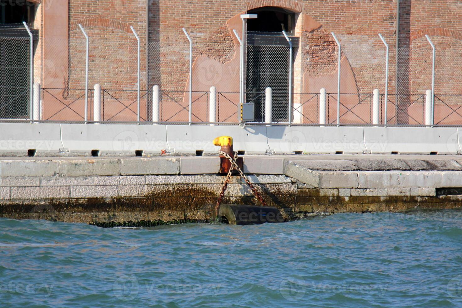 A pier on the shore for mooring boats and yachts. photo