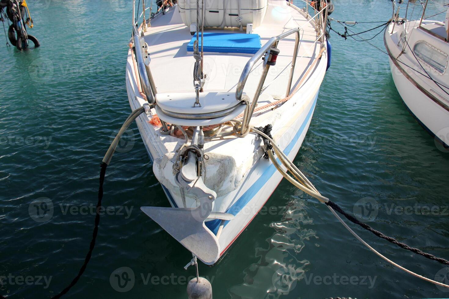 A pier on the shore for mooring boats and yachts. photo