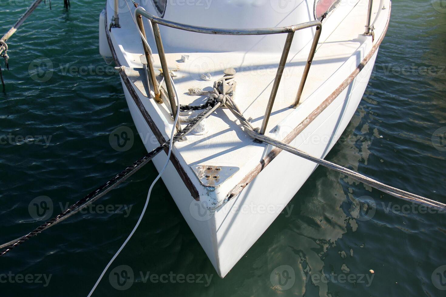 A pier on the shore for mooring boats and yachts. photo