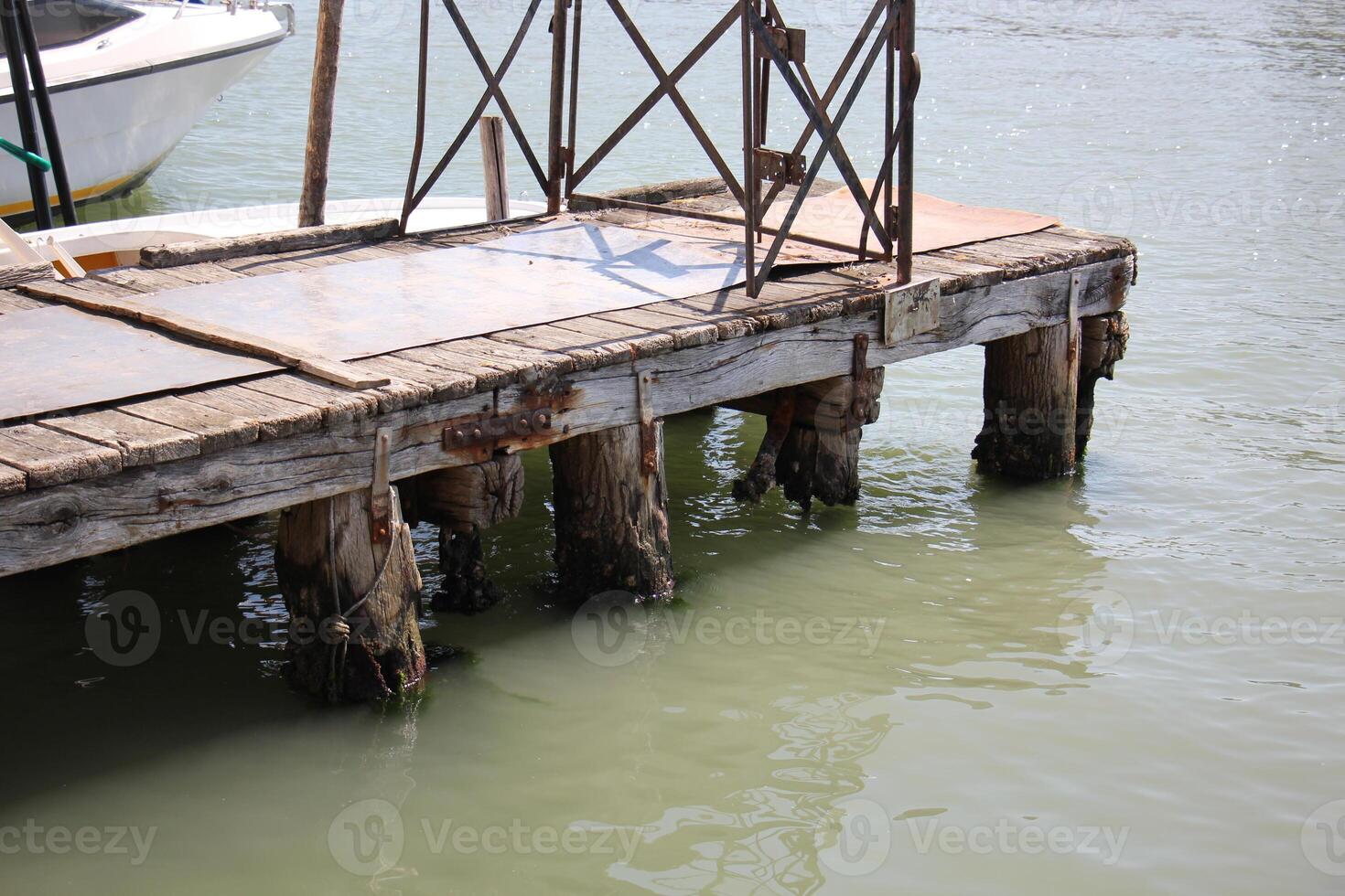 A pier on the shore for mooring boats and yachts. photo