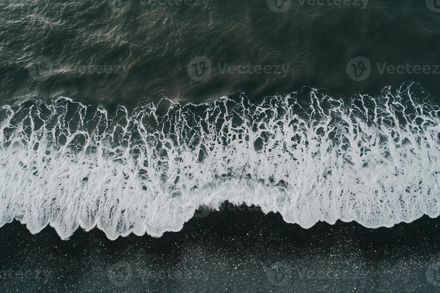 photo vertical overhead shot of a wavy sea