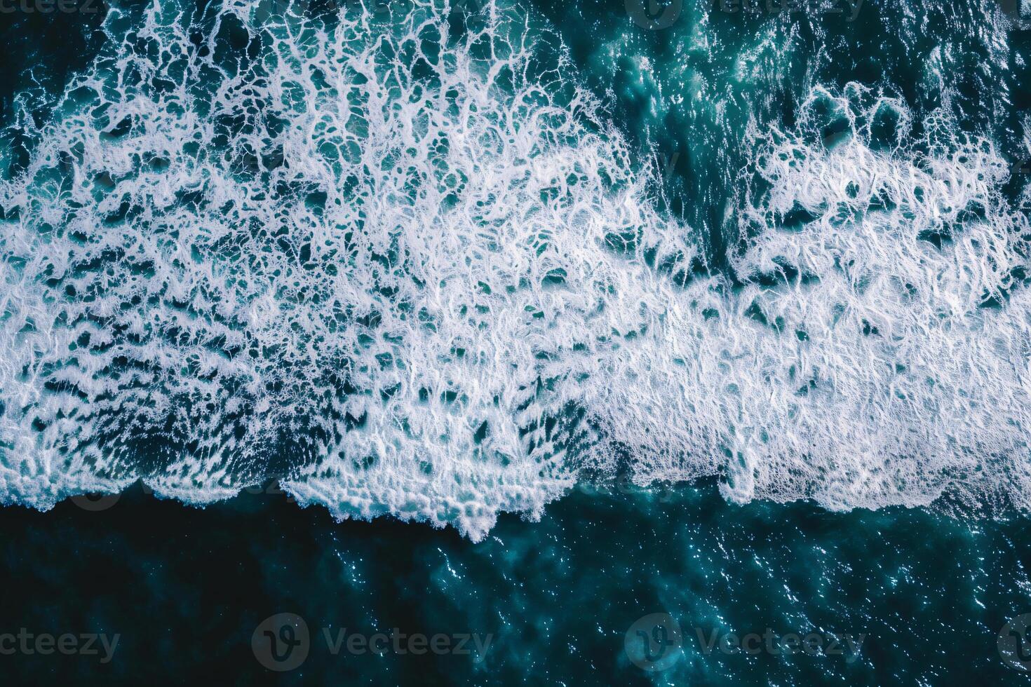 photo vertical overhead shot of a wavy sea