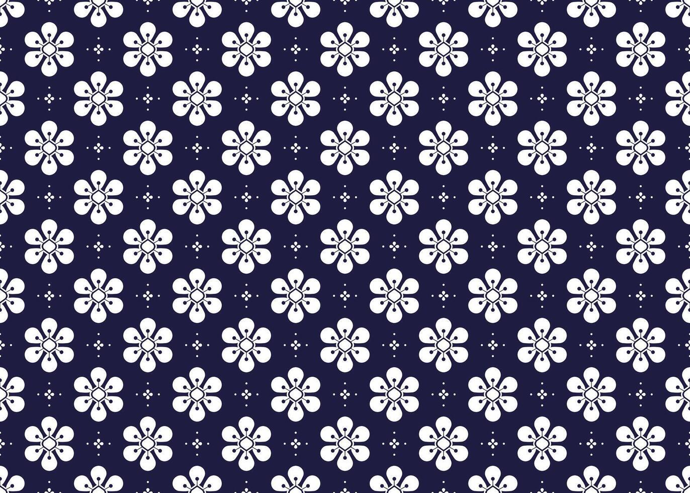 Symbol geometric white flowers design on dark blue background seamless fabric ethnic pattern for cloth carpet wallpaper wrapping etc. vector