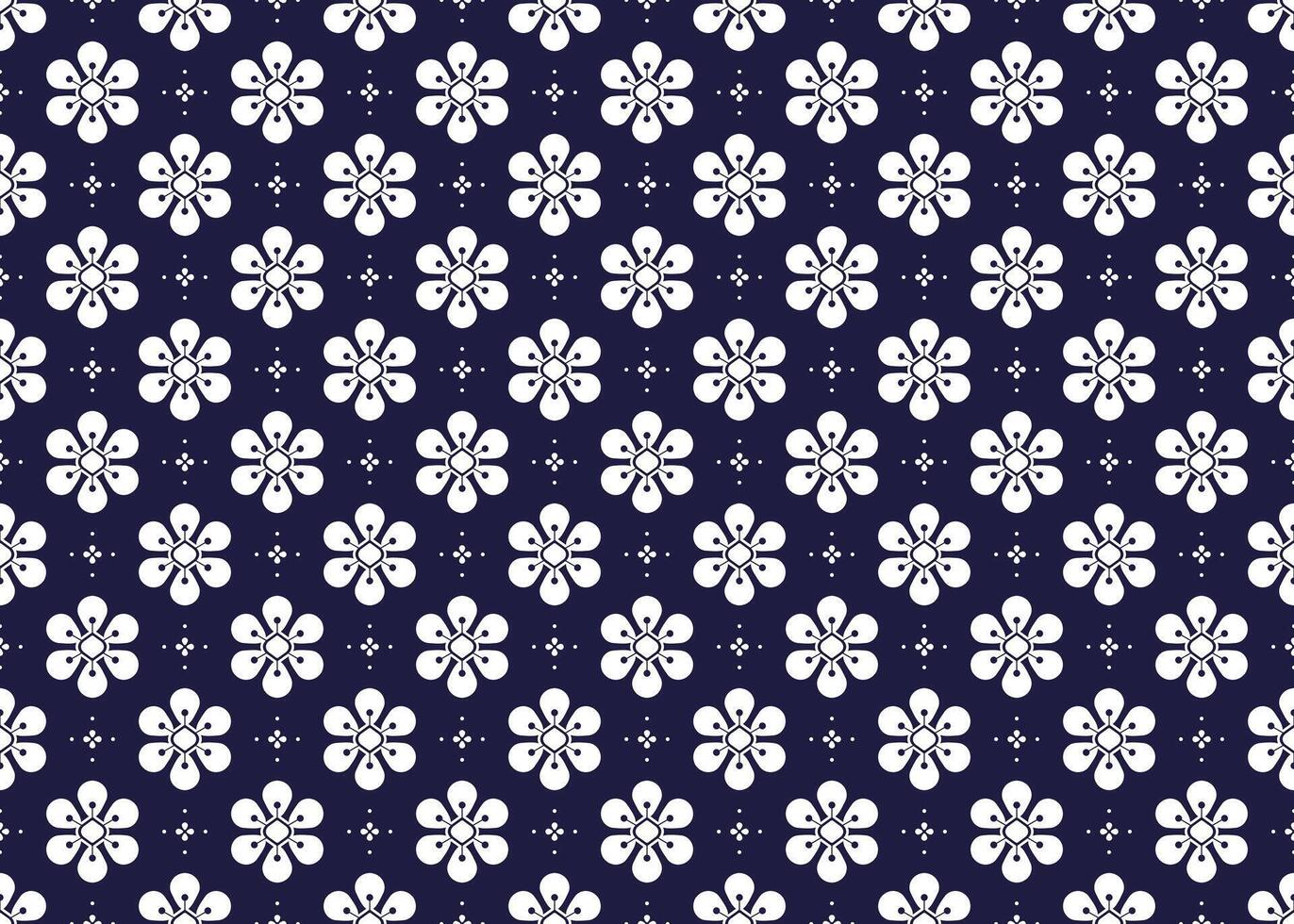 Symbol geometric white flowers design on dark blue background seamless fabric ethnic pattern for cloth carpet wallpaper wrapping etc. vector