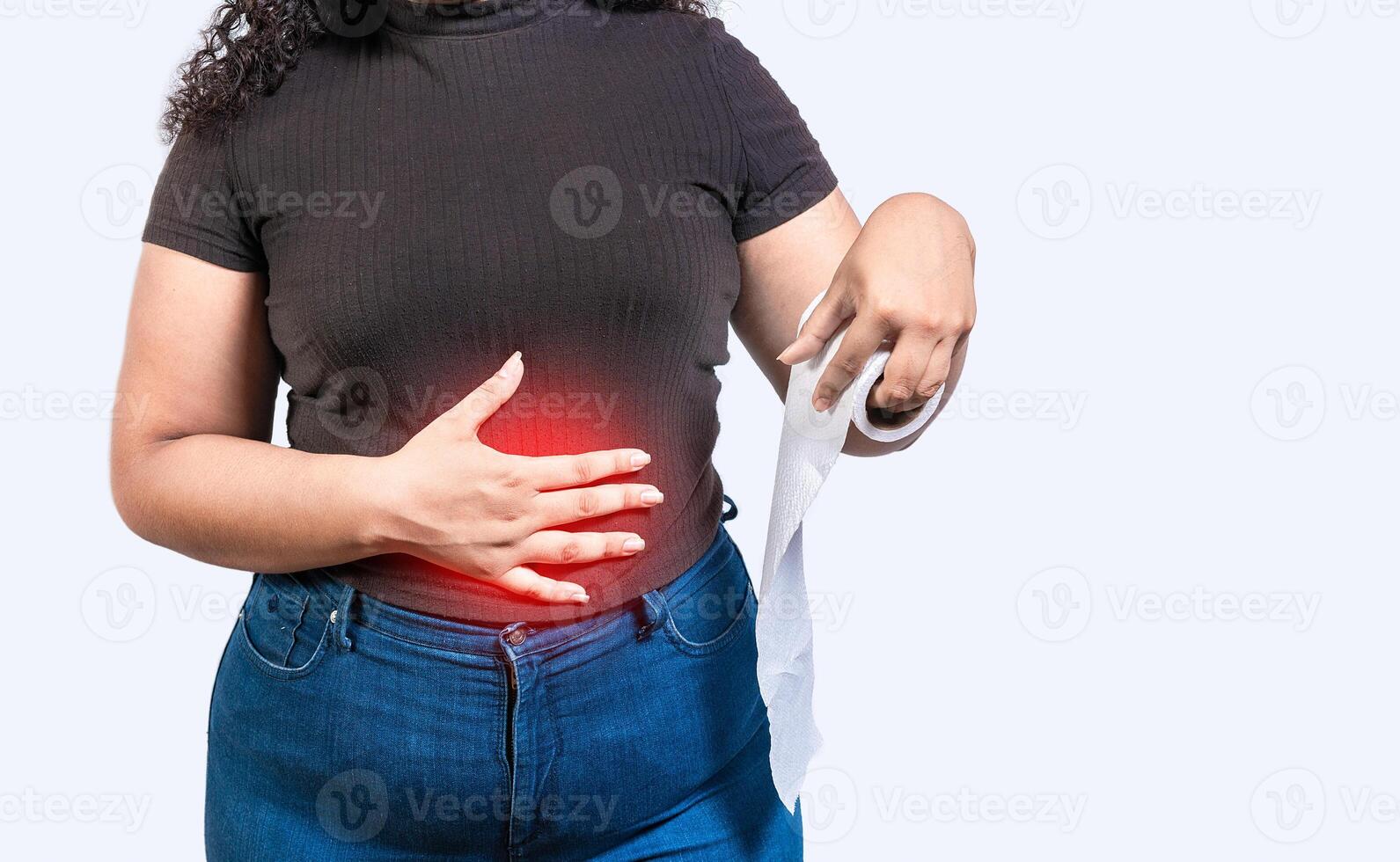 Woman with stomach problems holding roll of paper. Person with stomach pain holding paper roll isolated photo