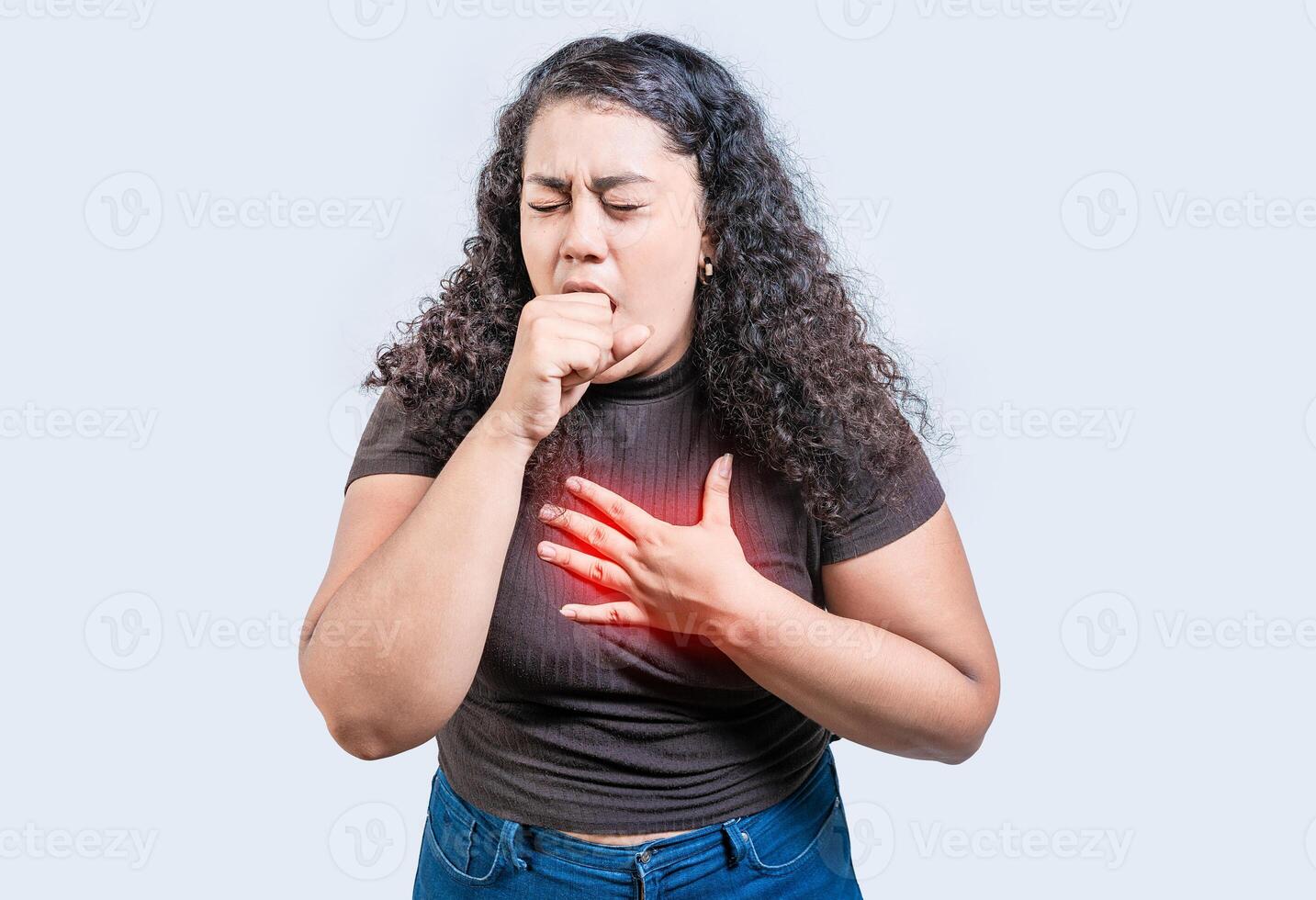 Girl with bronchitis coughing hard isolated. Young woman suffering from cough isolated photo