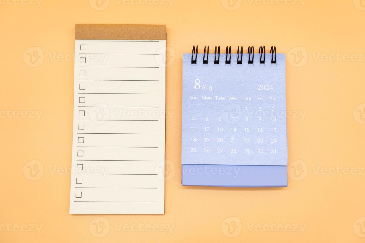 Blank to do list for text with checkbox and Simple desk calendar on AUGUST 2024. Empty Check list. Copy Space. isolated background. To do list in August 2024. photo