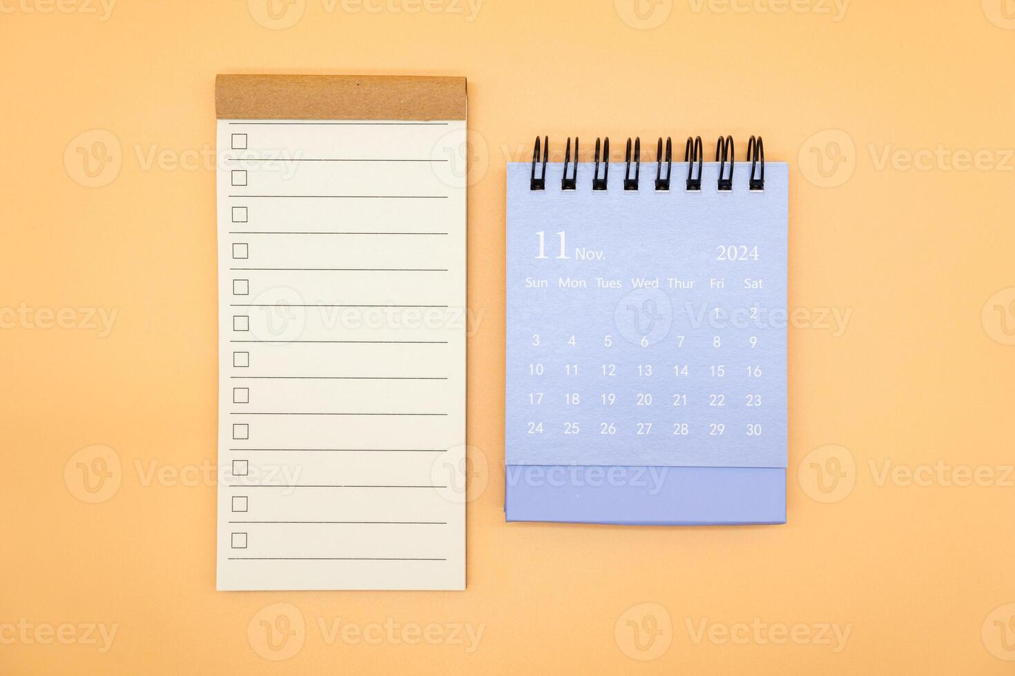 Blank to do list for text with checkbox and Simple desk calendar on NOVEMBER 2024. Empty Check list. Copy Space. isolated background. To do list in November 2024. photo