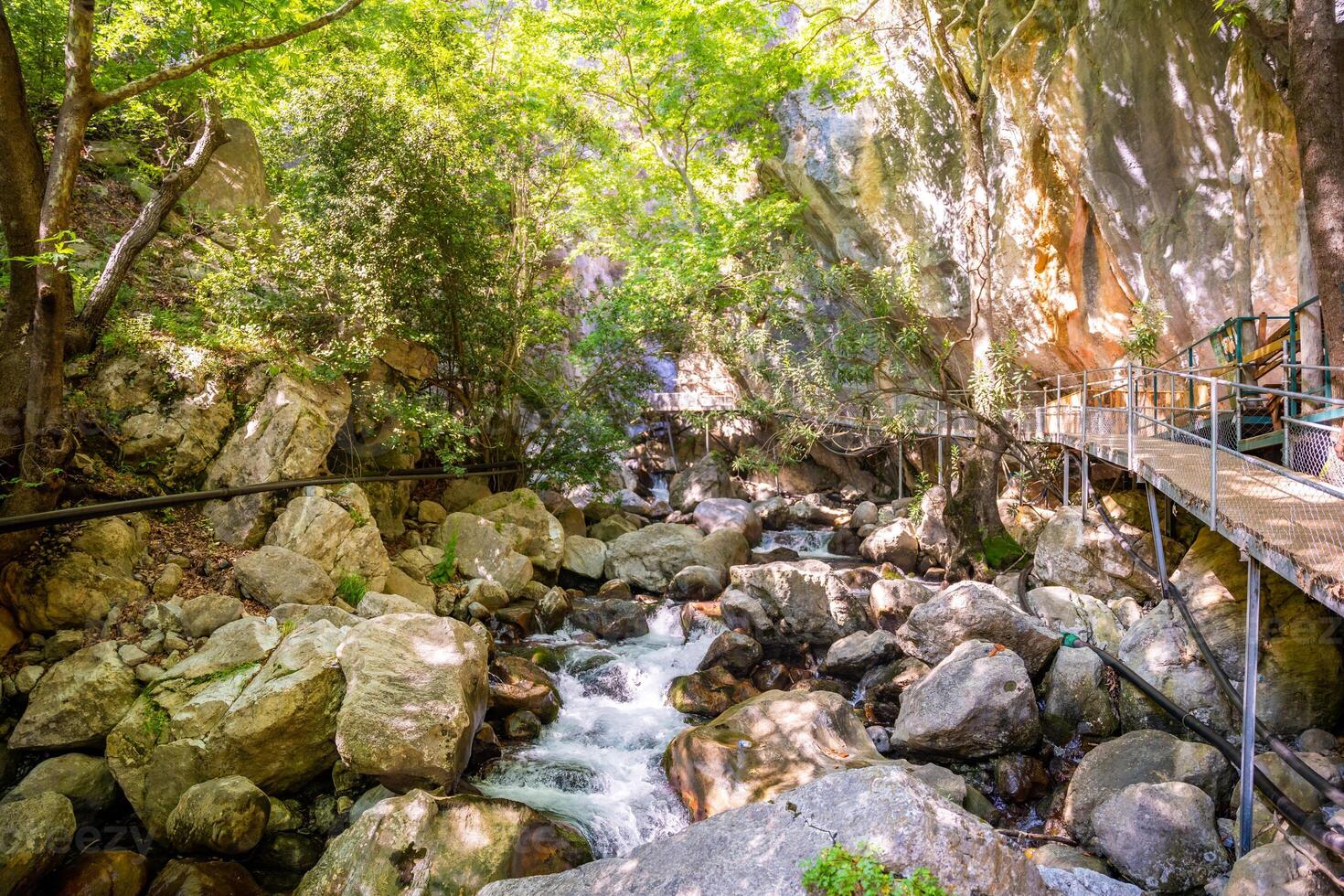 Sapadere canyon with wooden paths and cascades of waterfalls in the Taurus mountains near Alanya, Turkey photo