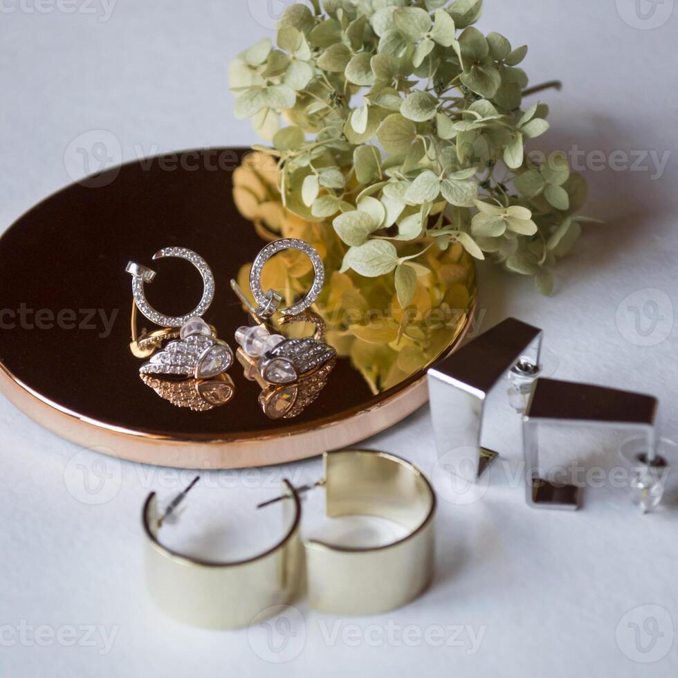 Female jewels on the table photo