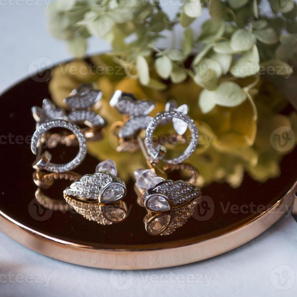 Female jewels on the table photo
