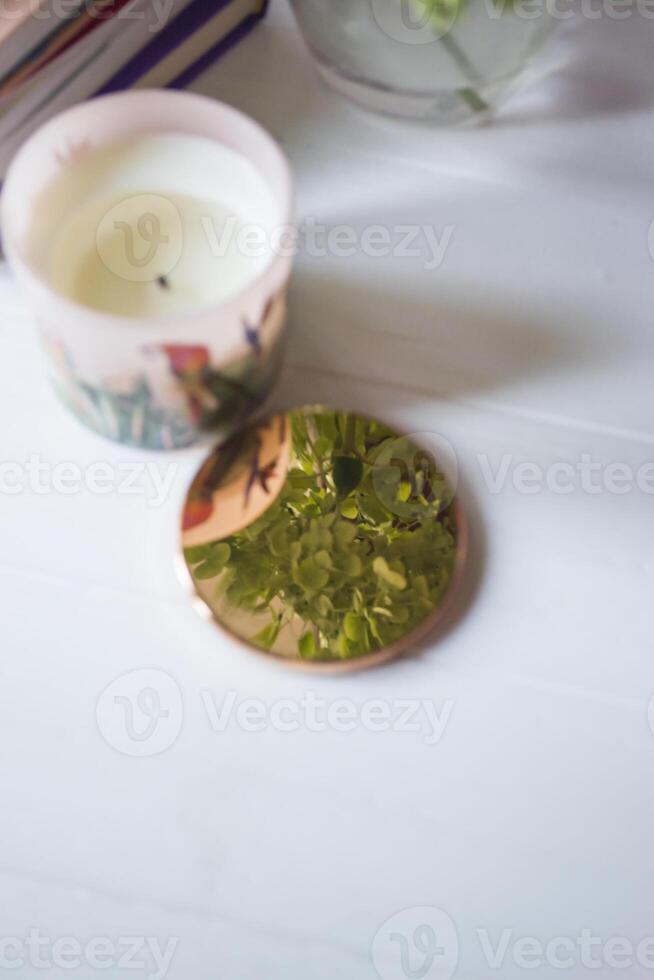 Reflection of hydrangea on a mirror surface. photo
