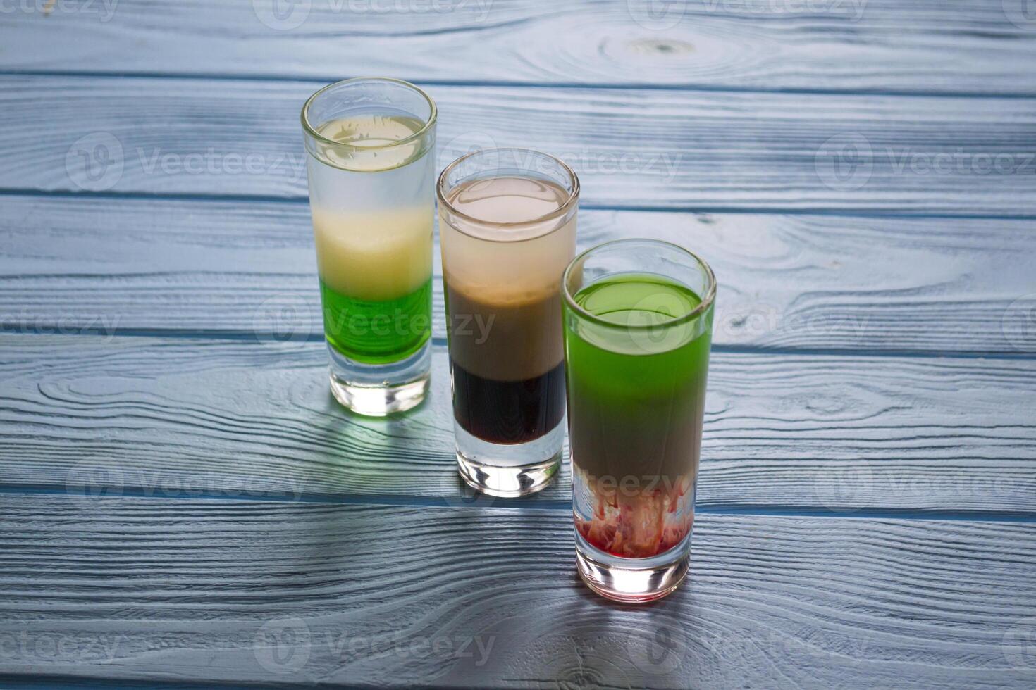 The alcohol shots on a table. photo