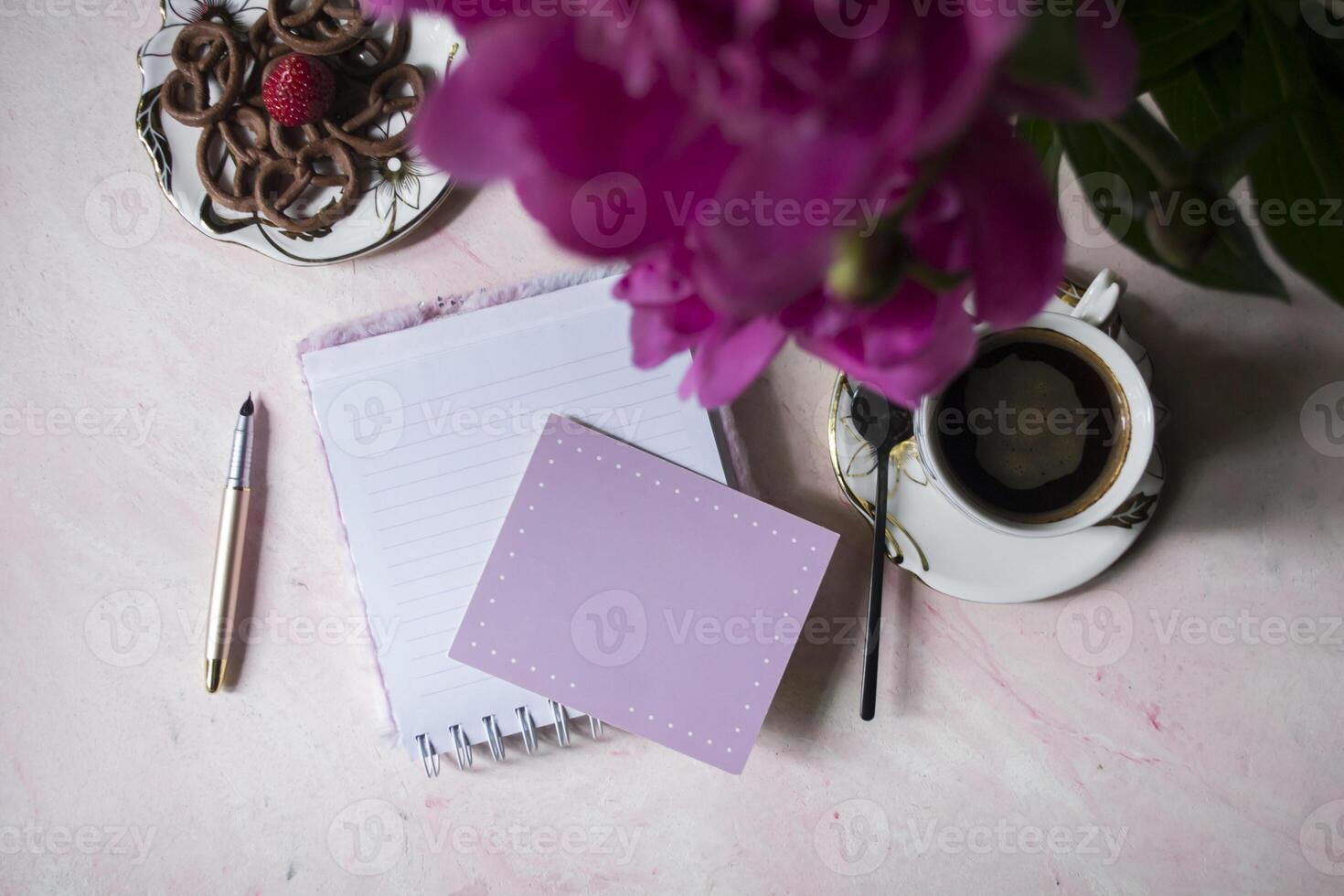 Coffee, empty paper and peony. Background with place for text. photo