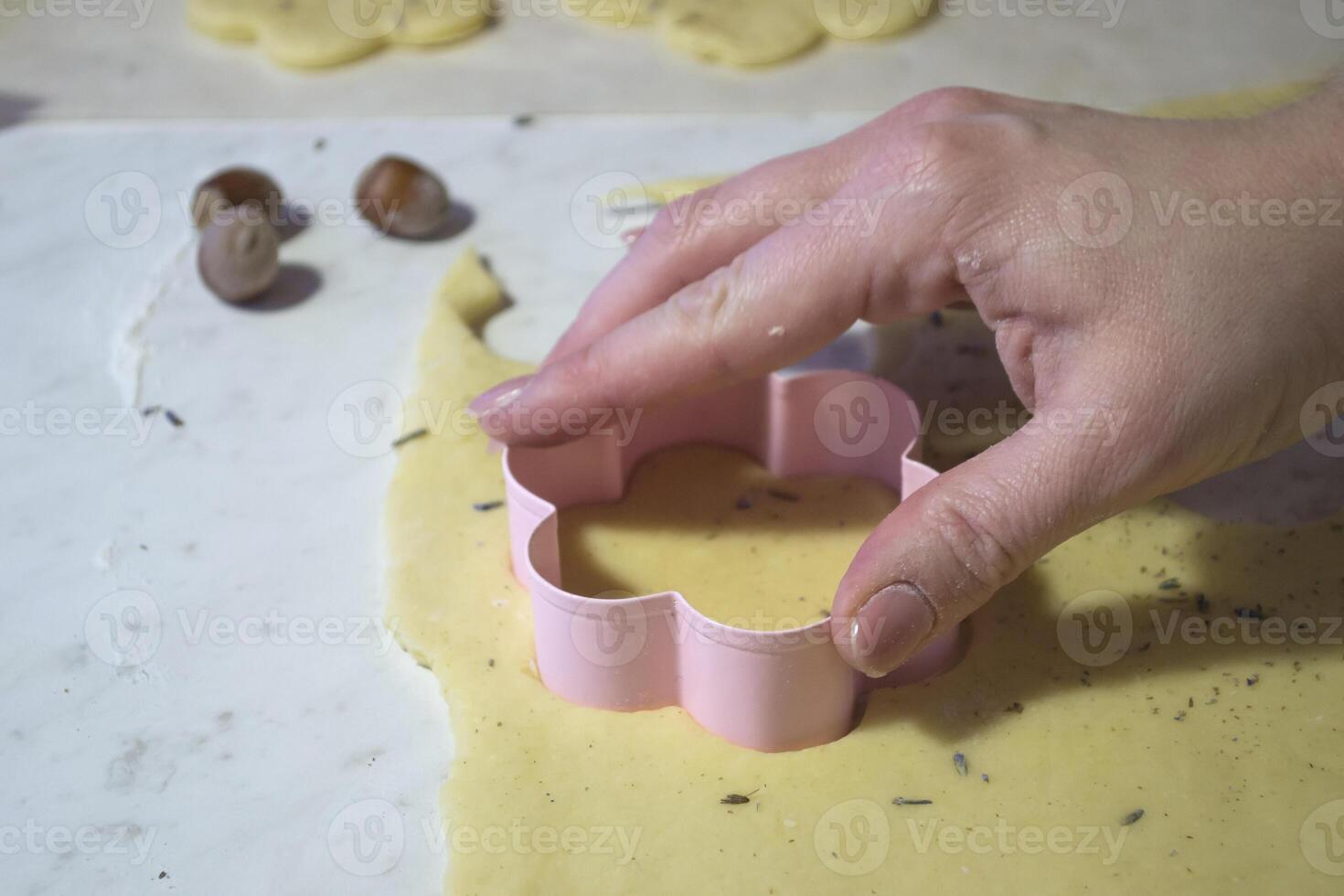 Baker making the cookies. photo