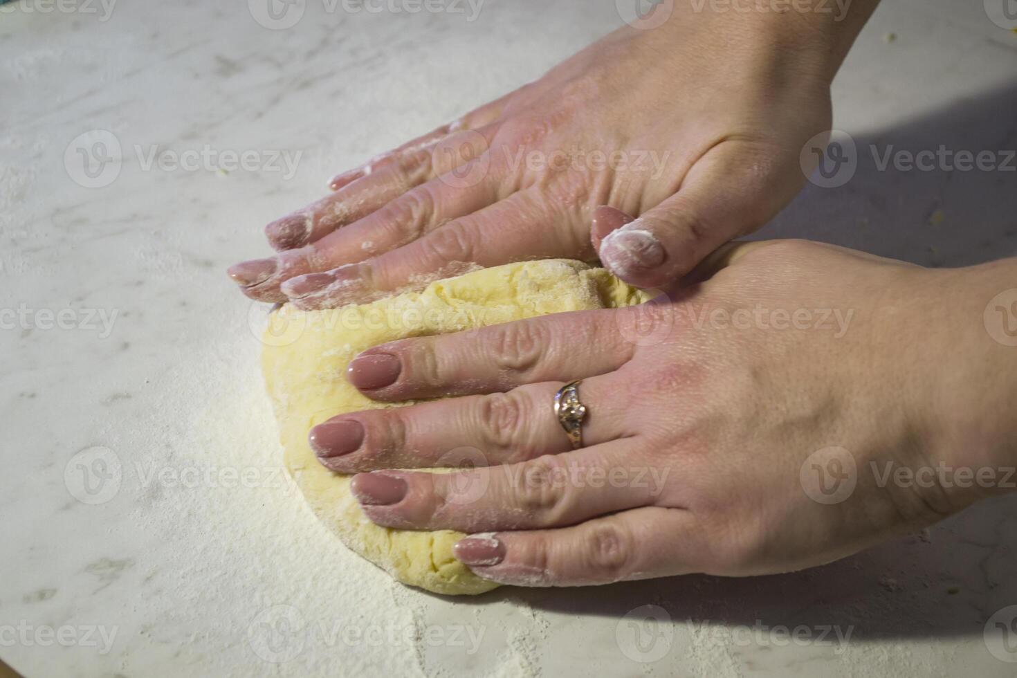 The baker making a pastry for cookies. photo