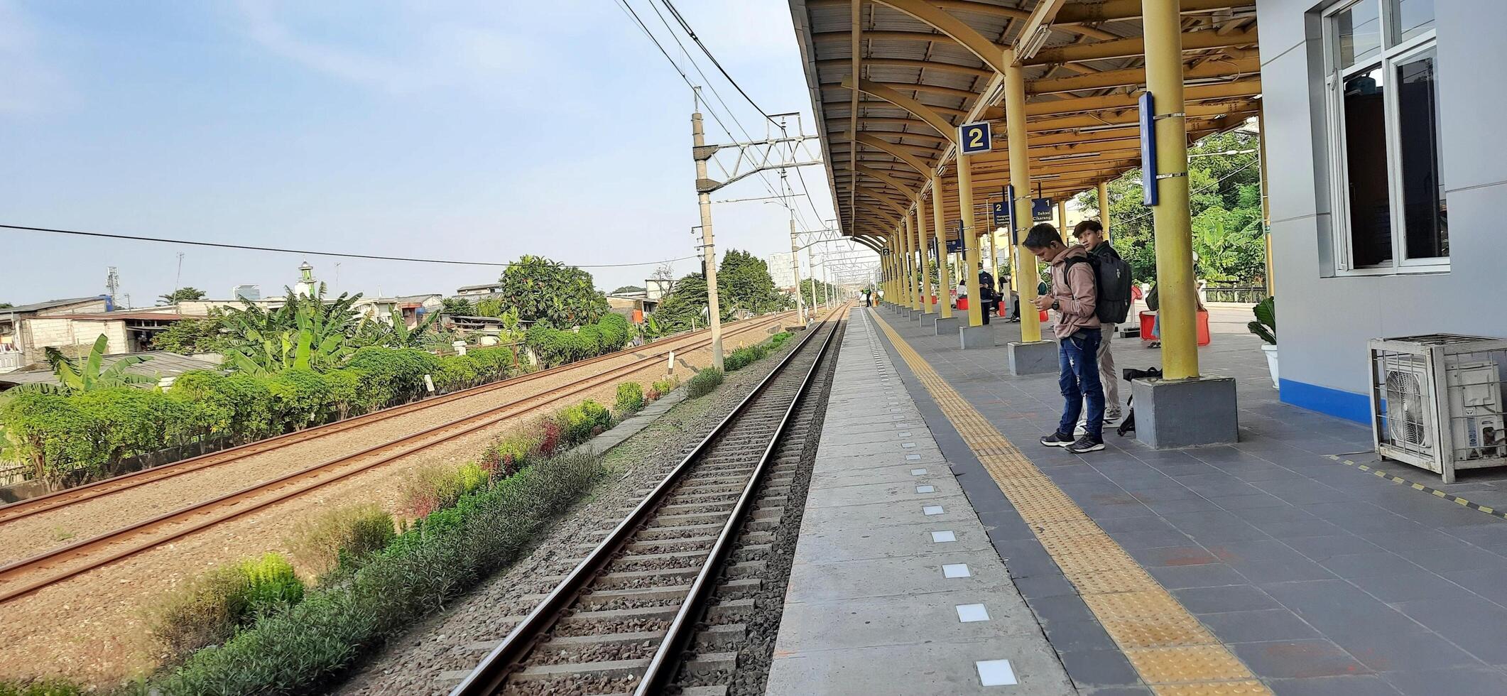 Activity people at railway train station Bekasi. Local train Indonesia