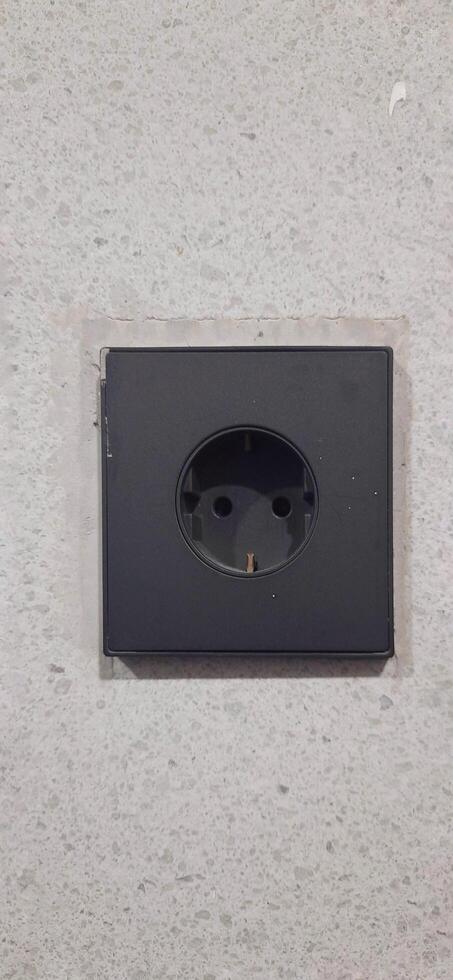 Power socket electrical and wall switches black colors photo