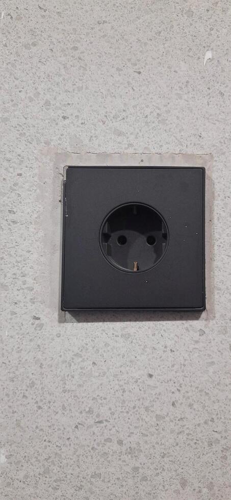 Power socket electrical and wall switches black colors photo