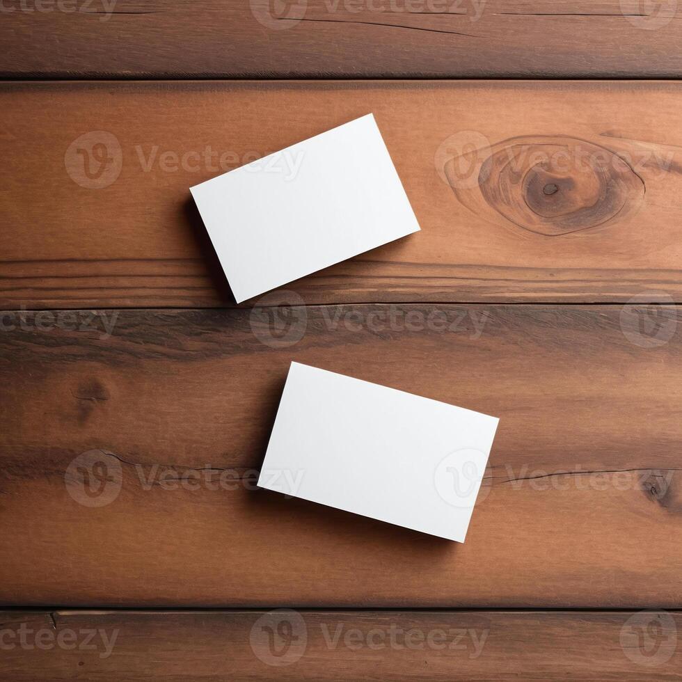 Blank business card on a wooden surface photo