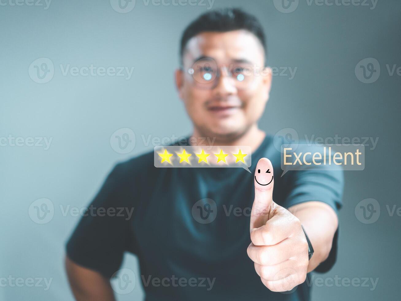 Customer man hand thumb up with popup five star and emotional smiley face icon for feedback review satisfaction, Customer service experience, and business satisfaction survey After-sale service center photo