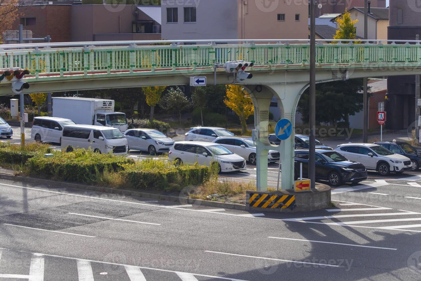 A traffic jam at the large crossing in Kyoto daytime photo