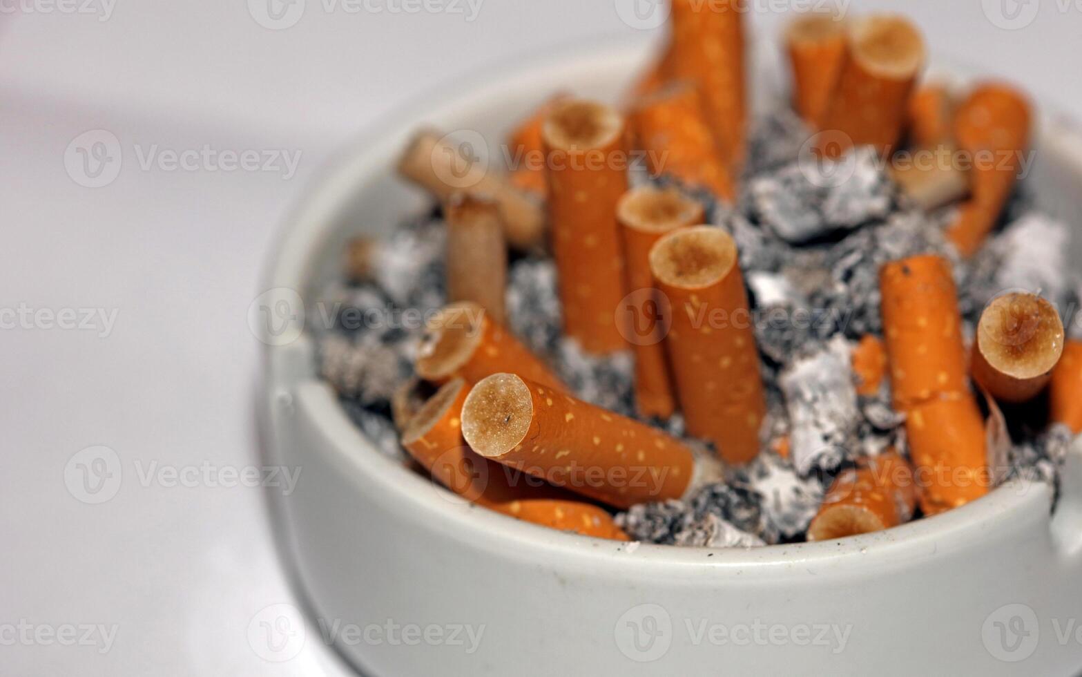 Full ashtray of cigarettes close up macro view smoking habits hi-res stock photography and images high quality big size instant download photo